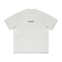 White t-shirt with a small black graphic on a white background