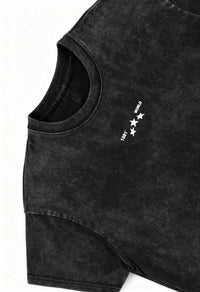 Black sleeveless shirt with a small white logo on a white background